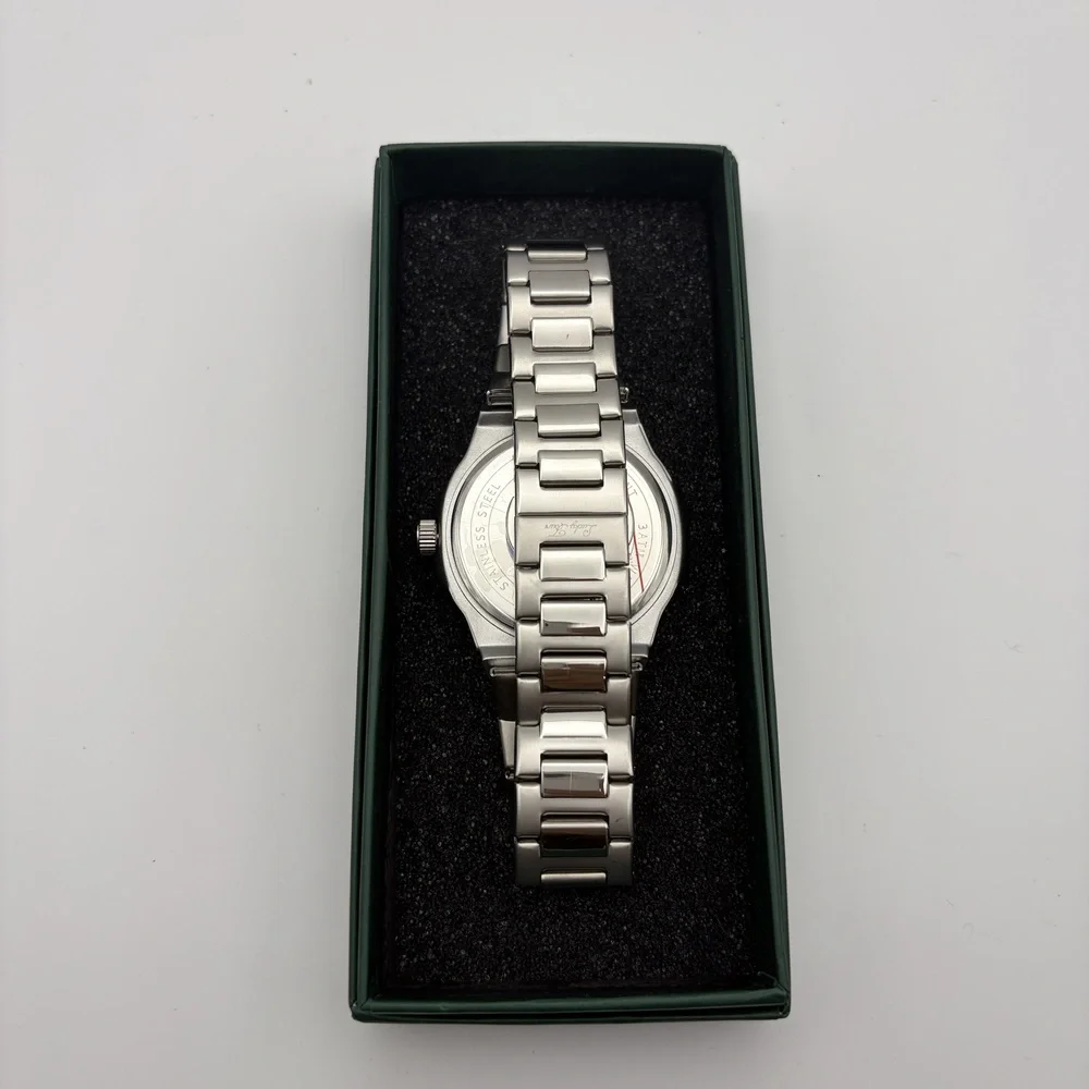 Lucky Fours watch green dial stainless steel , new battery